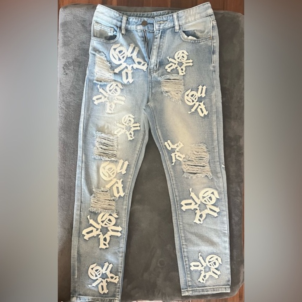 SHEIN Light Blue Jeans with White Skull Patches (Pre-Owned)